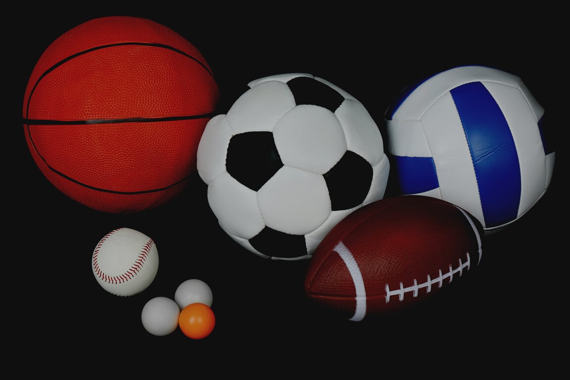 Sports Balls on Black Background